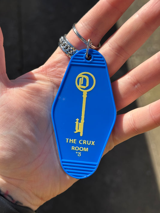 The Crux hotel keychain